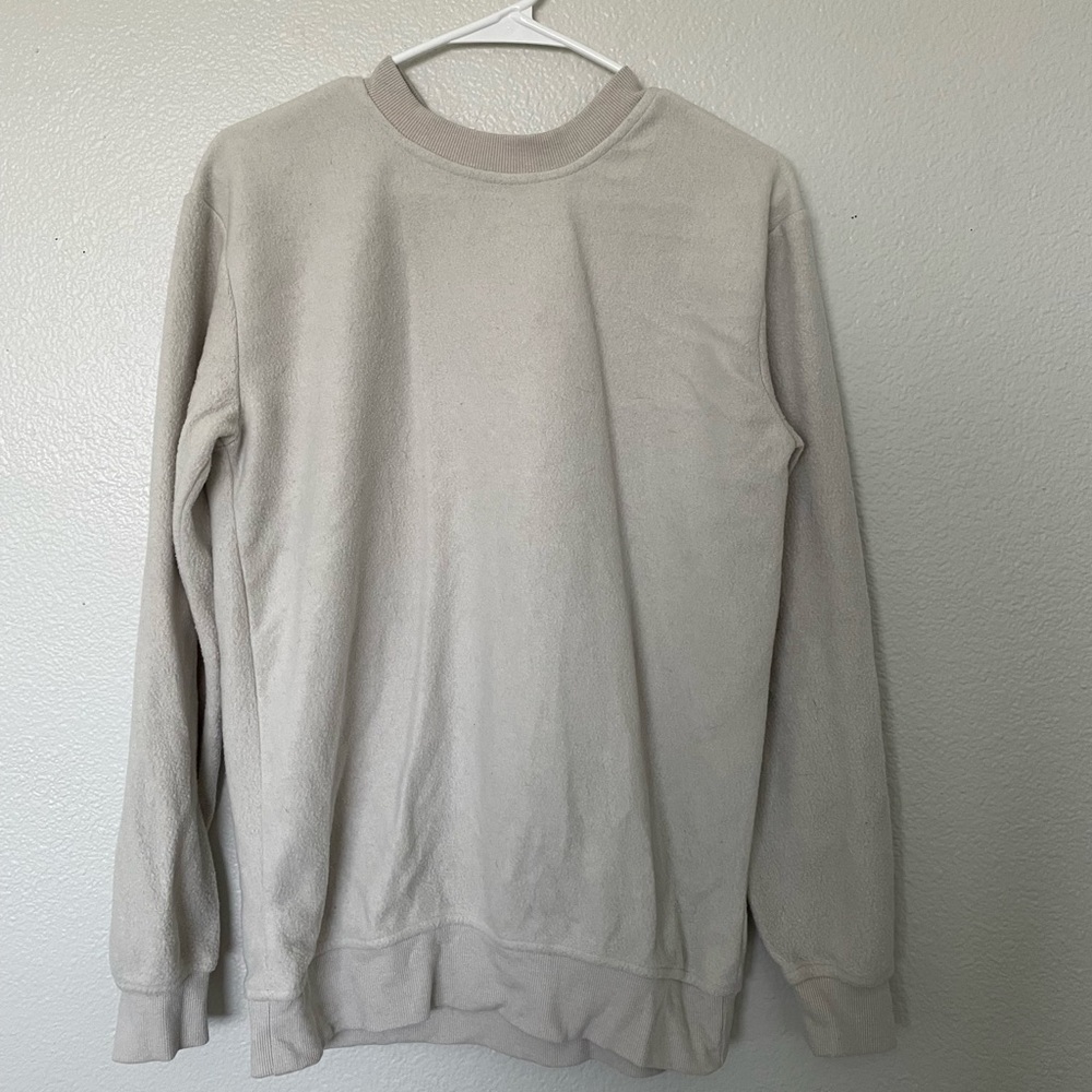 Cream crewneck sweatshirt